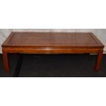 Quality hardwood low coffee table. 127cm wide x 51cm deep x 41cm tall