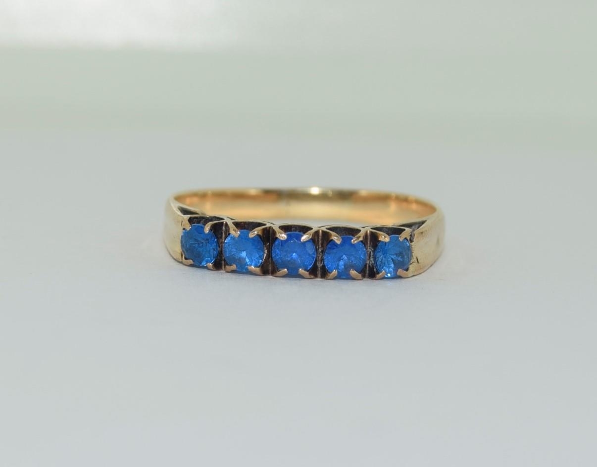 18ct gold ladies 5 stones blue topaz ring size O