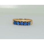 18ct gold ladies 5 stones blue topaz ring size O