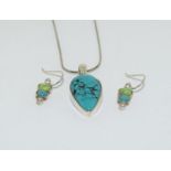 Teardrop Turquoise 925 silver pendant and earrings.