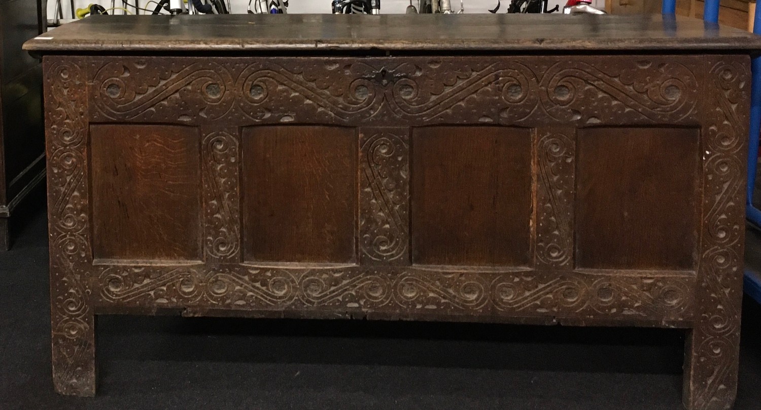 Good elm coffer with carved panels and original metal fitments solid plank top missing part of