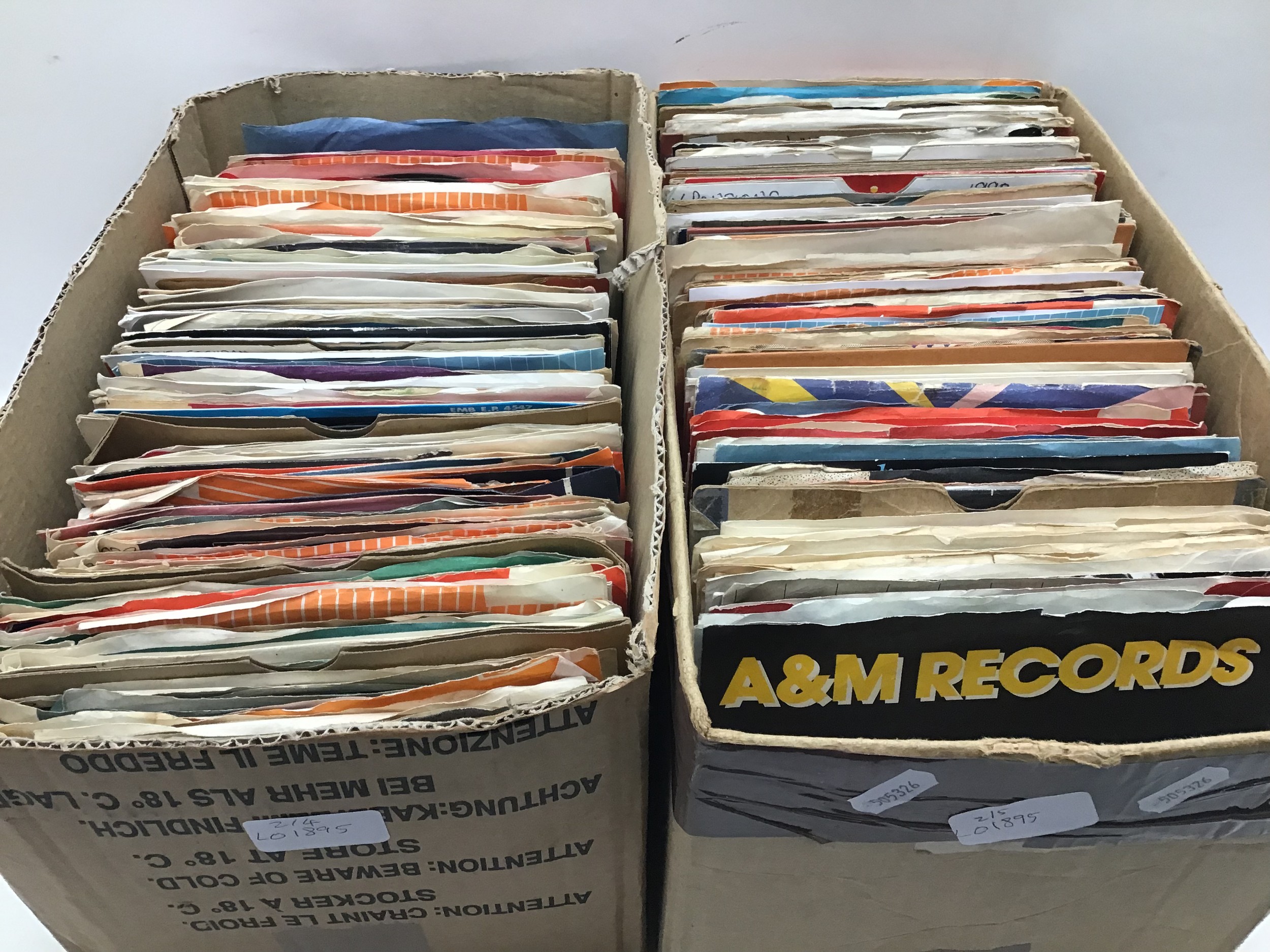 2 BOXES COTAINING SINGLE RECORDS FROM THE 60?s & 70?s. Many artists to include - Curved Air -