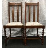 Pair of vintage oak dining chairs with barley twist legs each 98x36x42cm.