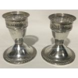 Pair sterling silver dwarf candle sticks 8cm tall