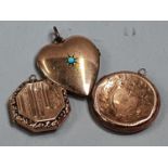 Three ladies lockets to include gold.