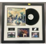SIGNED OASIS FRAMED ALBUM COVER. Not by Oasis but by the owner of Creation Records ?Alan McGee?
