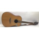 WASHBURN ACOUSTIC GUITAR. This 6 stringed guitar is finished in rosewood and comes with a strap.