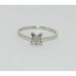 Silver ladies star shape ring. Size S.