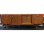 G Plan 1960's low sideboard fitted with alcohol cabinet, four drawers and double width cupboard. Has