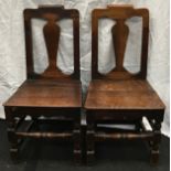 A pair of antique oak Georgian country chairs each 95x47x42cm.