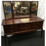 Stag Minstrel dressing table with tri fold mirror to top 128x131x46cm.
