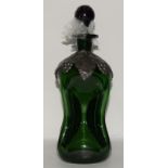 Art Nouveau olive green blown glass decanter with pewter overlaid decoration of applied leaves &