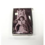 A silver plated vesta case with nude pictorial image.