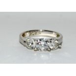 A silver 925 three stone CZ ring Size Q (Ref DR9)