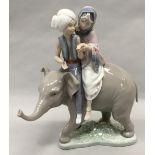 Lladro "5352" rare Hindu Children on Elephant porcelain figure.