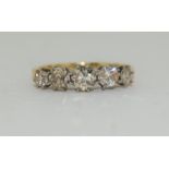 An 18ct yellow gold five stone diamond ring of 1.35cts, Size P