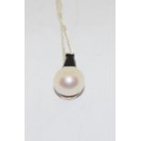 Quality cultured pearl black onyx 925 silver pendant.