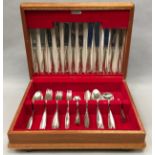 Cutlery canteen containing a quantity of plated flatware.