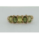 9ct gold antique set ladies 5 stone peridot ring size N