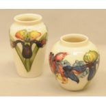 Moorcroft Clematis Vase 11cm tall toether with an Orchid vase 14cm ,both marked to base (2)