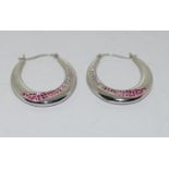 Beautiful pink/white gemset 925 silver hoop earrings.