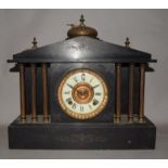Antique marble mantle clock with ivory face.