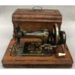 Vintage wooden cased Frister Rossman sewing machine