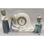 Lladro "6259" Pierrot Rehearsing together with Lladro "5777" Swan Clock and Nao girl figure (3).