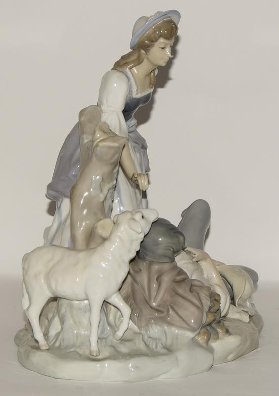 Lladro large group depicting a reclining shepherd with girl & sheep 1970's retired piece approx 11. - Image 2 of 5