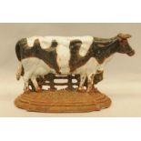 Cast iron painted door stop in the shape of a cow 23x38x8cm