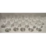 A large quantity of stemmed crystal drinking glasses to include 17 large and 5 small.