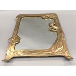 A silver plated Art Nouveau style easel backed mirror.