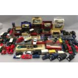 A large collection of modern die cast cars boxed and unboxed.