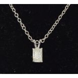 An 18ct white gold diamond emerald cut pendant necklace of 60 points Approx.