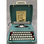 Vintage Smith-Corona Corsair 1960's/1970's typewriter with instruction booklet.