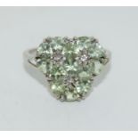 A 925 silver ring with green stones, Size T 1/2.