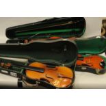 3 vintage cased violins all requiring some attention.