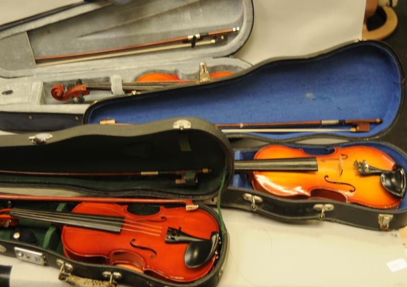 3 vintage cased violins