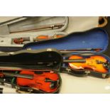 3 vintage cased violins