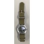 Lemonia military wristwatch with crow foot marking back and front