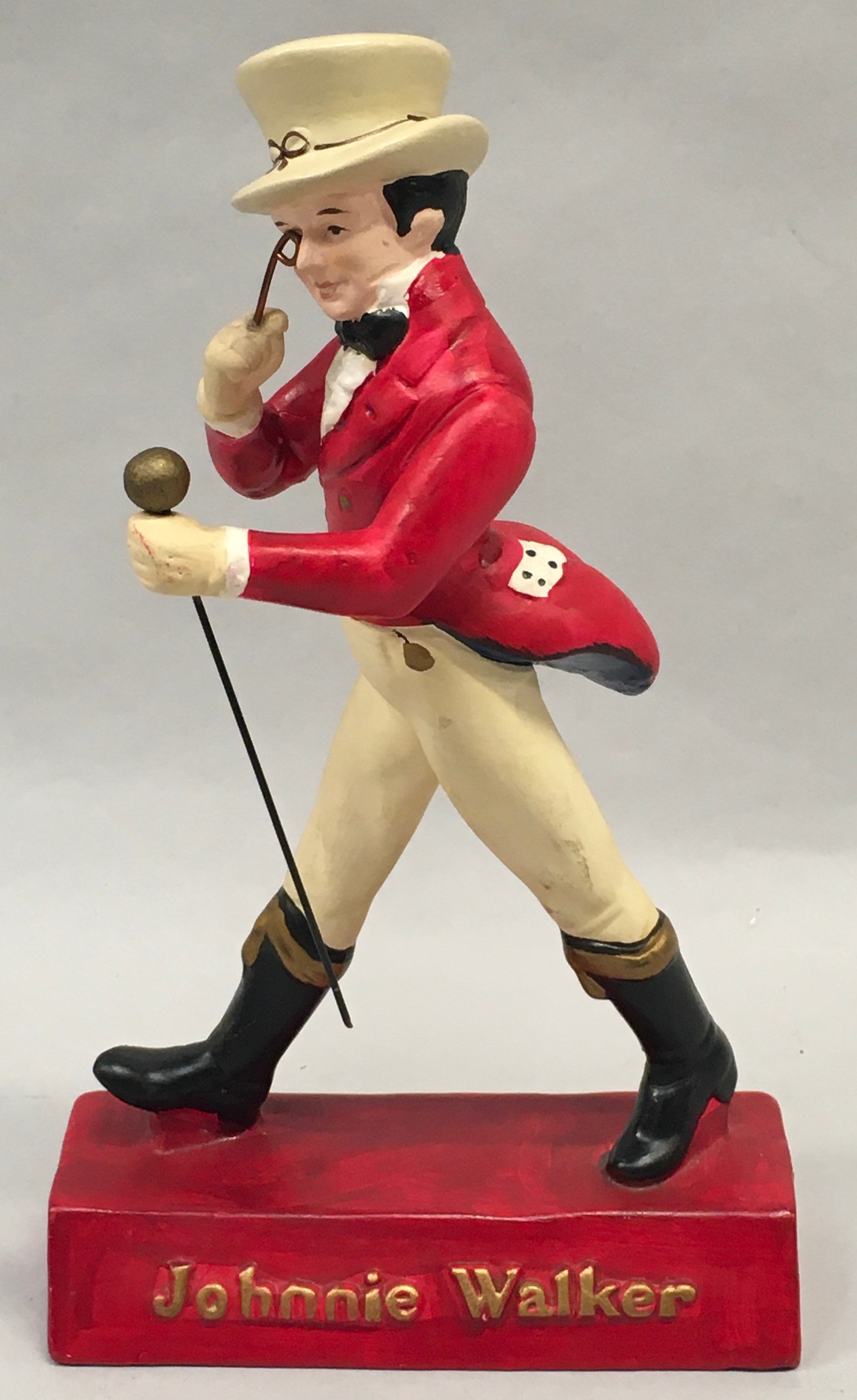 A pottery Johnny Walker advertising figure 1940's.