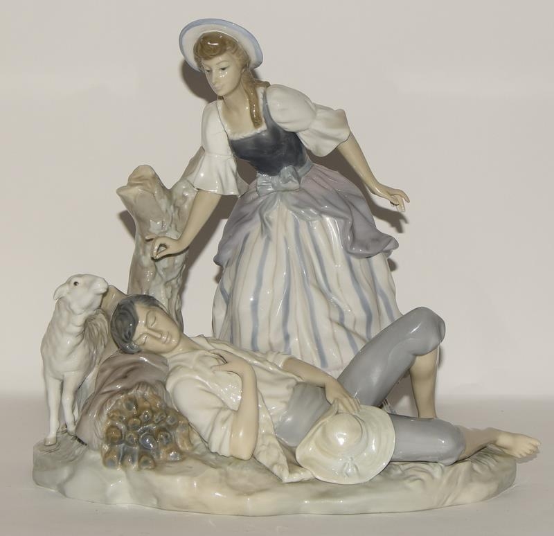 Lladro large group depicting a reclining shepherd with girl & sheep 1970's retired piece approx 11.