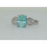 A 1 carat Neon Paraiba Tourmaline and diamond 18ct white gold ring, Size N