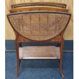 Edwardian inlaid magazine rack and book trough with cane work panels.