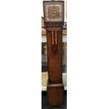 Oak grandmother clock with in set square face Westminster chime with key 136cm tall