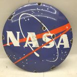 Enamel sign marked NASA 30cm dia