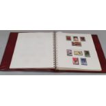 Wine red album of Jersey stamps