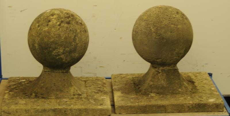 Pair of large round stone gate finials on square base. Base size 20.5" x 20.5"