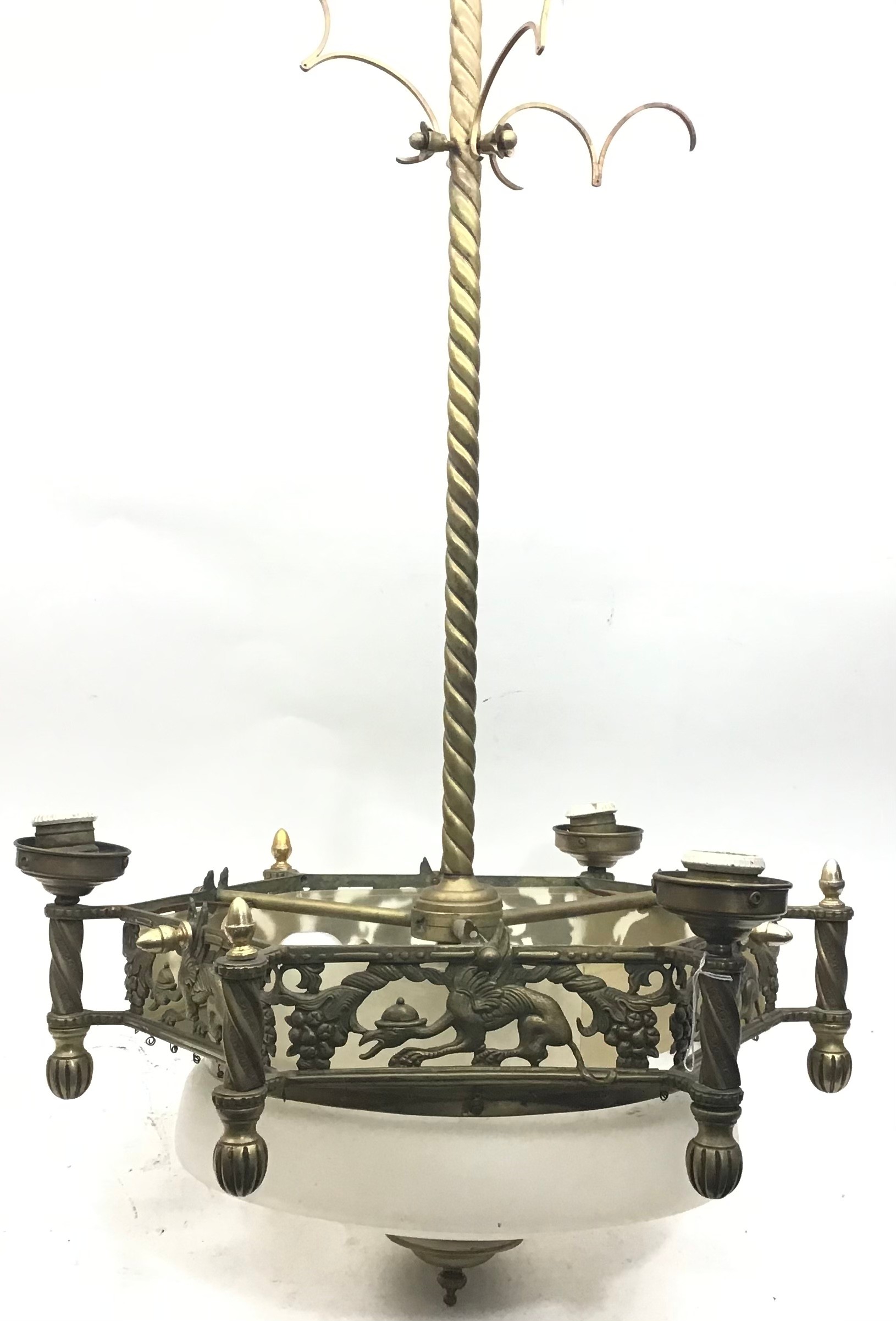 Brass mounted ornate ceiling center light with frosted bowl