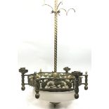 Brass mounted ornate ceiling center light with frosted bowl